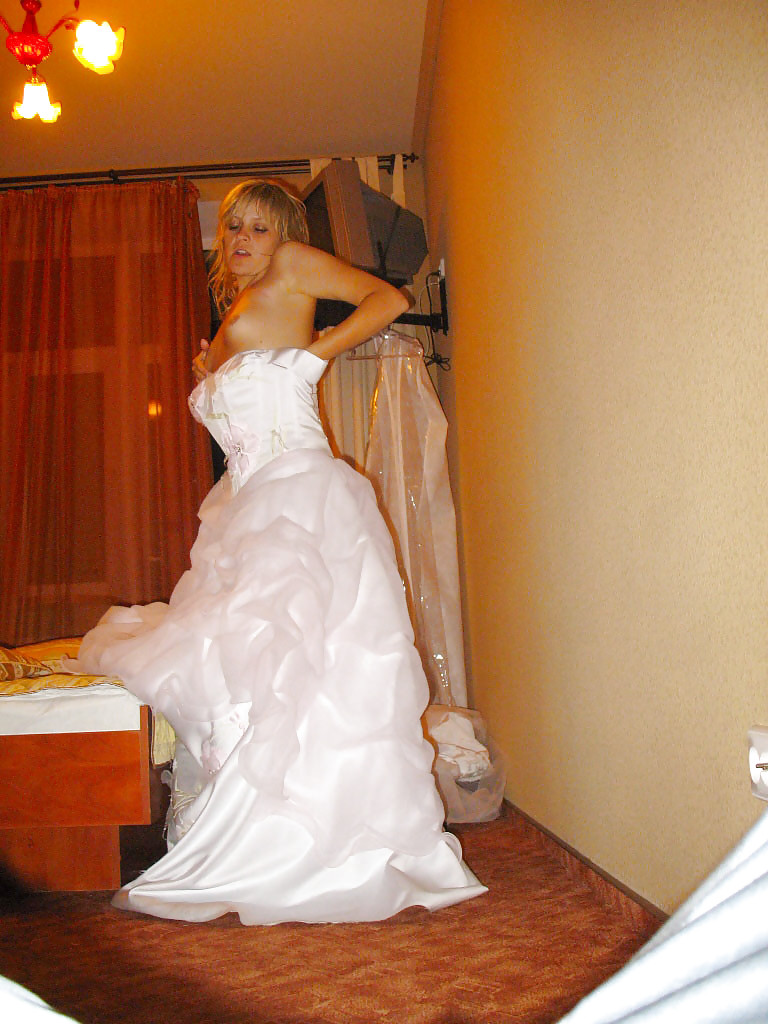 Here Cums The Bride adult photos