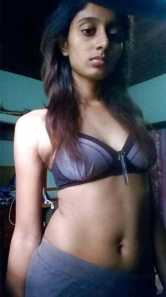 Indian skinny girl showing her small tits and shaved pussy adult photos