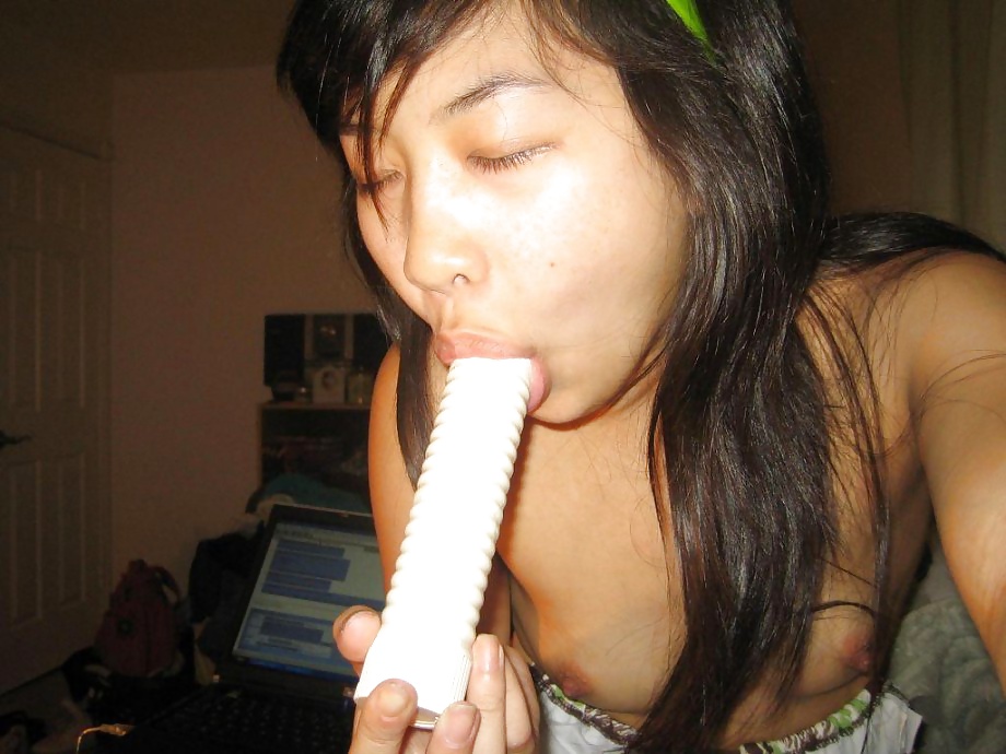 Asian Girl and Her Wet Toys adult photos