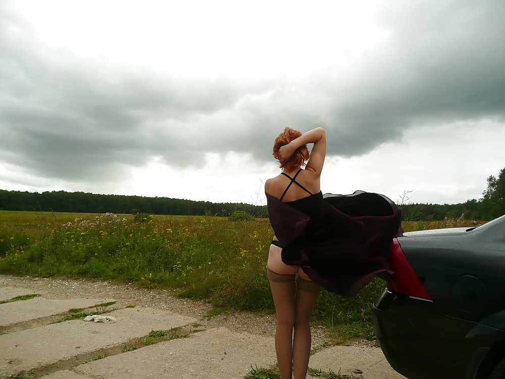 Mature amateur lady on a windy day. adult photos