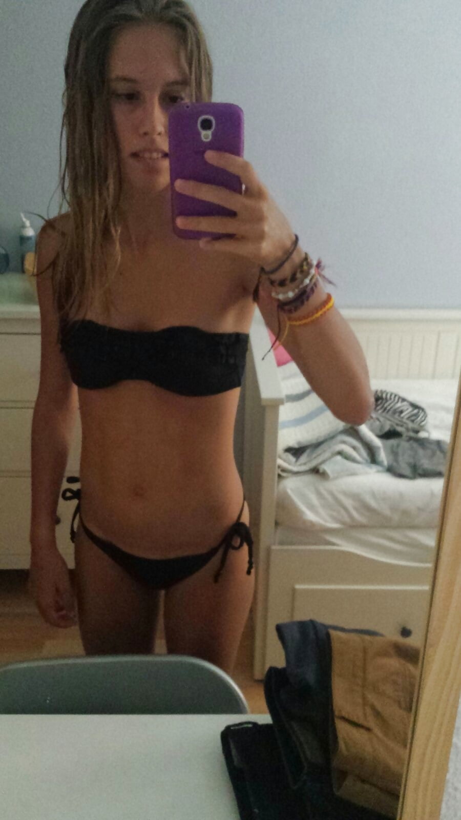 Skinny Teen Strips Showing Her Bush adult photos