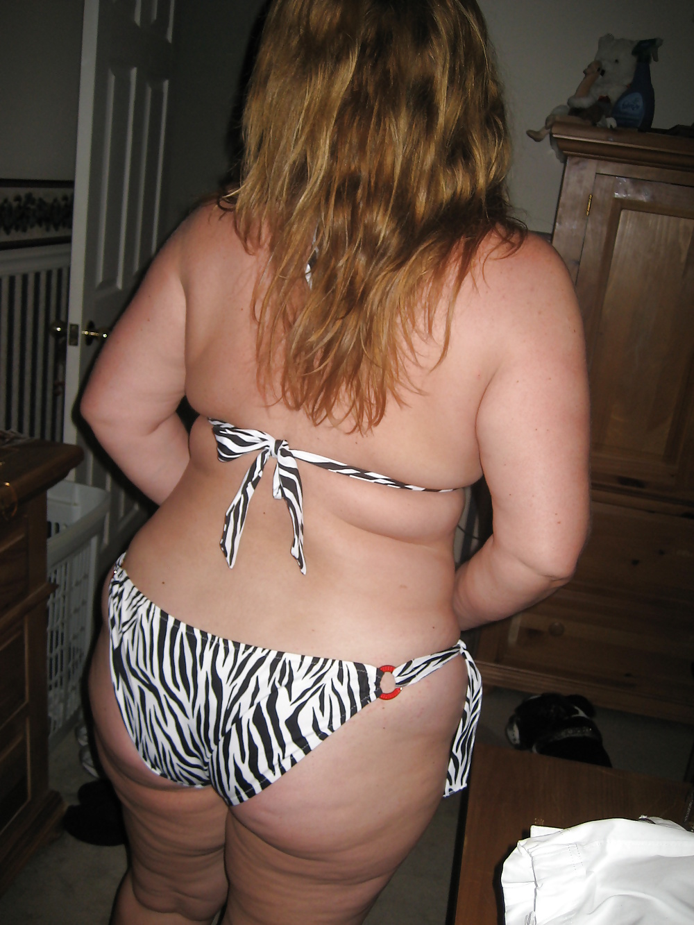 Fat Mrs. Whore in her Victoria's Secret bikini adult photos