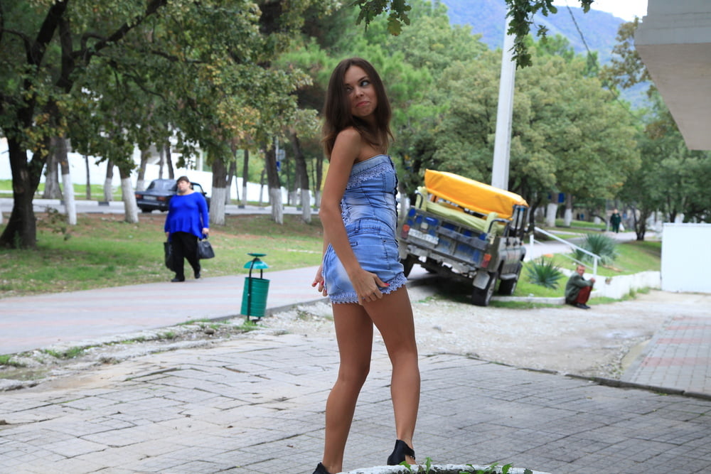 Sexy teen in blue dress in public adult photos