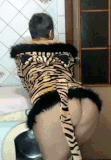 lukerya in small black panties with a long tiger tail         