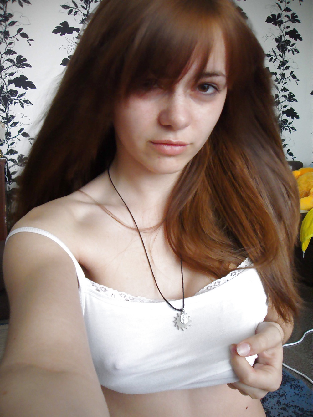 Russian teen knows how to work the camera adult photos